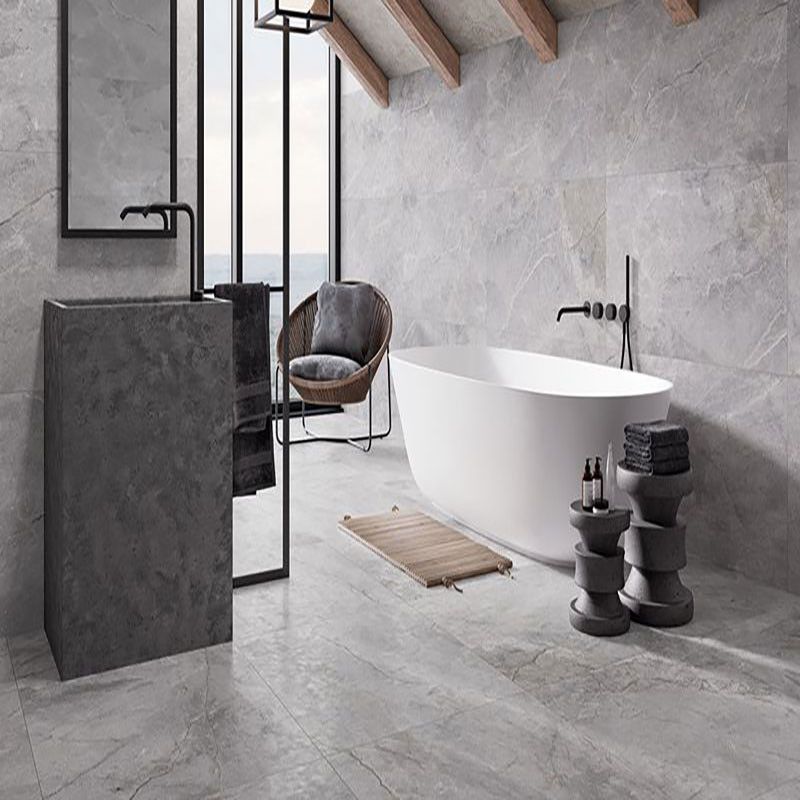 Lifestyle image of a bathroom with floor-to-ceiling tiling.