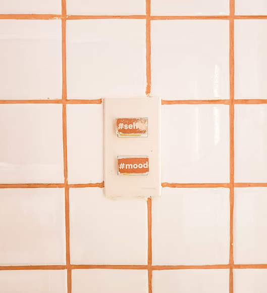 White tiles with orange grouting