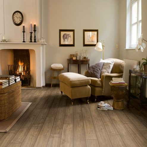 A living room with laminate flooring in it.