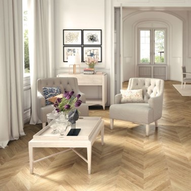 A stylish room featuring herringbone multi strip laminate flooring.