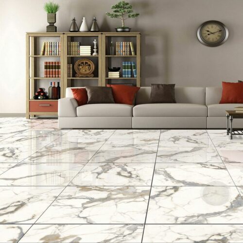 Large marble-effect rectified tiles in a living room.